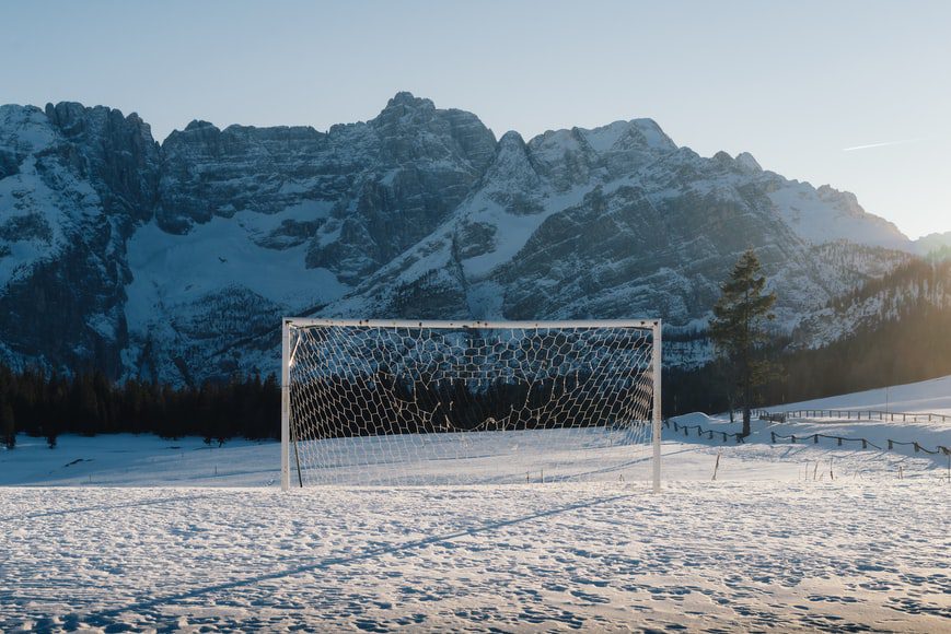 playing soccer in the snow