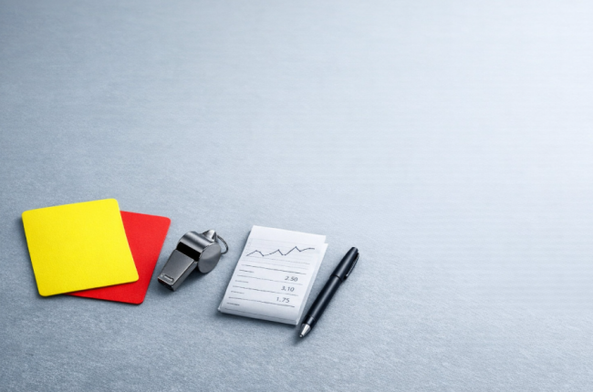 How referee profiles and card patterns influence match pricing